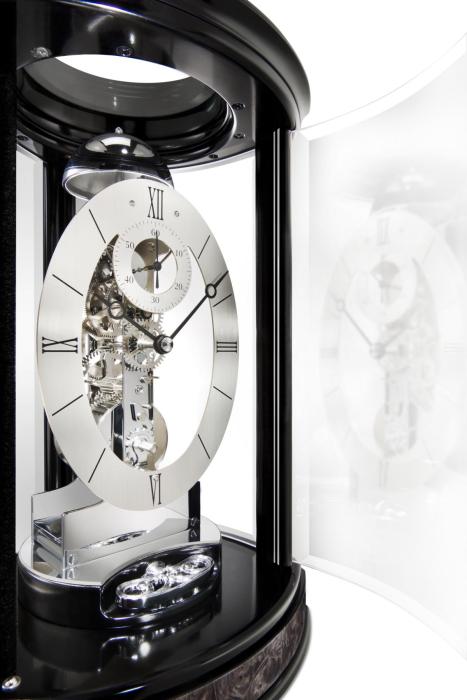 Trigon - Kieninger triangular modern table clock in chrome