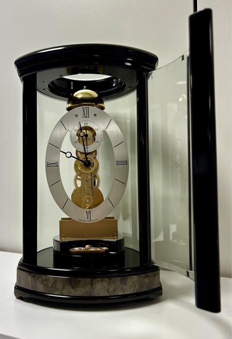 Trigon - Kieninger triangular modern table clock in chrome